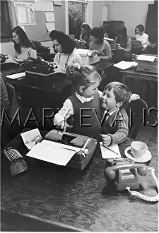 Typists: Children in office