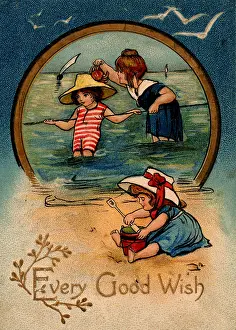 Paddling: Children paddling and playing on the sands