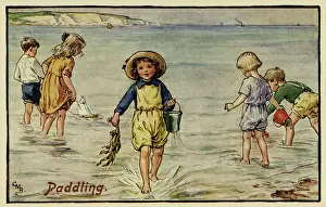 Children paddling at the seaside