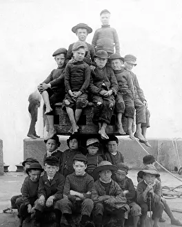 Capstan: Children palying on quayside capstan