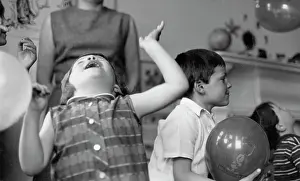 Huckleberry: Children at a party with balloons