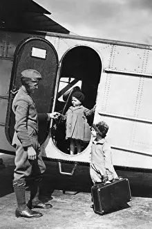 Purposes: Two children next to a plane of the Lufthansa, 1928