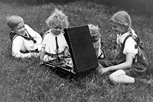 Phonograph: Children play with a gramophone, 1930