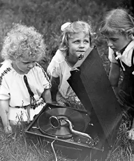 Phonograph: Children play with a gramophone, 1930