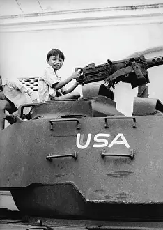 Salas Collection: CHILDREN PLAY ON TANK