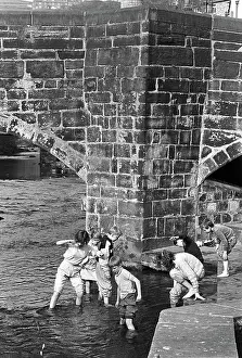 Packhorse: Children play in the water of Hebden Beck