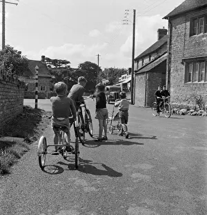 Kingsbury: Children playing on bicycles