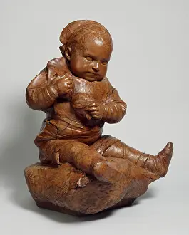 Pillow: Children playing on a cushion with a puppet