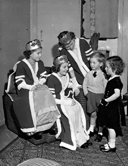 Studded: Children playing a game of Coronations