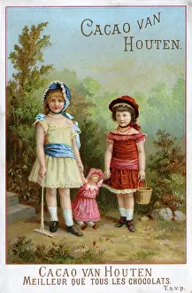 Houten: Two children playing in their garden with their dolly
