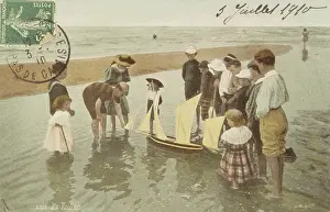 Tide: Children playing with a model sailing boat
