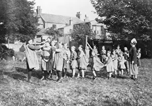 The Childrens Society: Children playing Oranges and Lemons