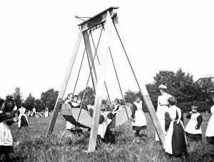 Swingboat: Children playing in a park