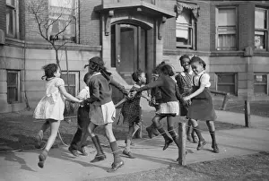 Rosie: Children playing ring around a rosie in one of the better ne