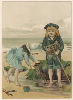 Rockpool: Children playing in a rockpool at the seaside
