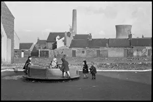 Landsdowne: Children playing on a roundabout in the Landsdowne
