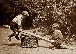 Seesaw: Children playing on a seesaw