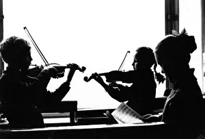 Practise: Children playing violins