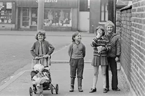 Bonfire: Four children with pram containing a guy
