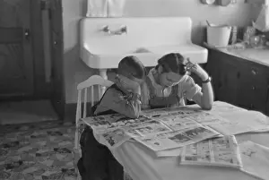Tenants: Children reading Sunday papers, Rustan brothers farm near D