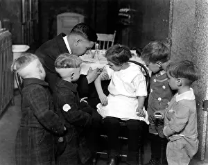 Immunity: Children receiving vaccinations by Dr. John ?