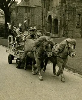 Blackley: Children riding in cart pulled by ponies, Manchester
