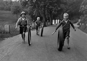 Tires: Children rolling tires