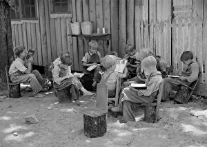 Landowners: Children on rustic hand made chairs in an outdoor