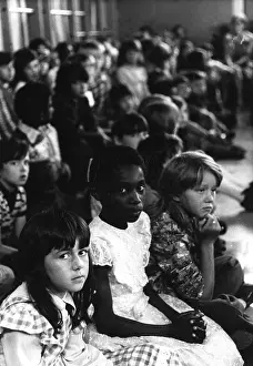 Glum: Children in a school hall