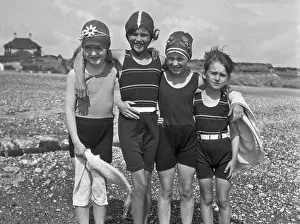 Towels: Four children at the seaside