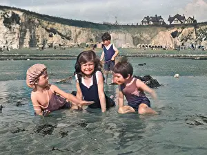 John Maclellan: Four children at the seaside