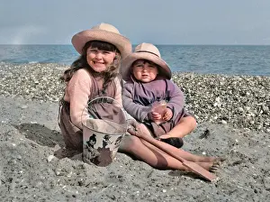 Pebbly: Two children at the seaside