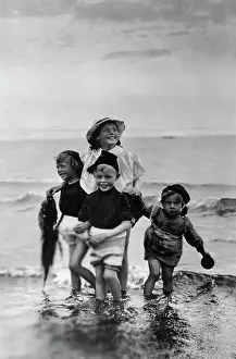 Frolic: Children at the seaside
