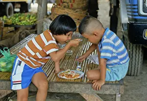 Equally: Children sharing a meal, Bangkok