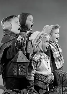 Scarfs: Four children singing Christmas carols