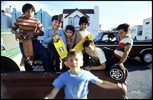 Skateboards: Children with skateboards, San Francisco, California, USA