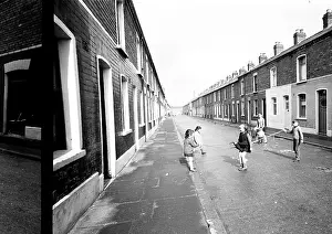 Children skipping in a street, Belfast, Northern Ireland