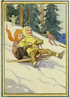 Sledging: Two children sledgeing down hill in the snow