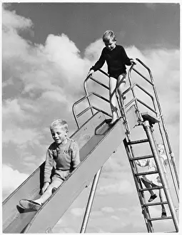 Playground: CHILDREN ON A SLIDE