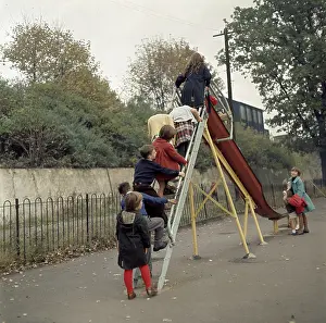 Slides: Children on a slide in a park