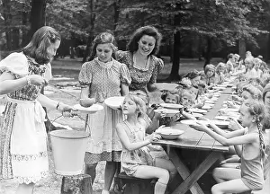 Looked: Children get soup during the holiday, 1942