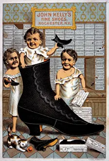 Preschooler: Children Standing with Large Shoe