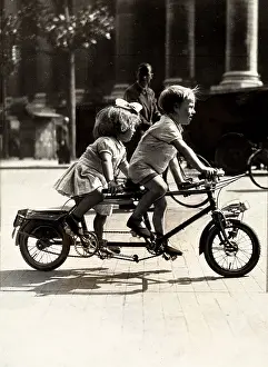 Tandems: Two children on a tandem