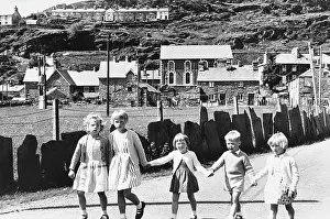 Cardigans: Five children walking in Wales
