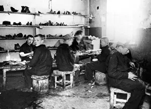 Shoemakers: Children working in shoemaker's workshop, Berlin