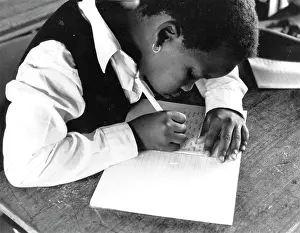 Seopedi: Children writing in class at Nonofelo primary