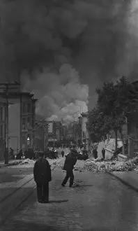Rocked: Chinese-American men watching the destruction ?
