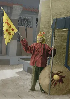 East Asia: Chinese Boxer with shield and banner on urban