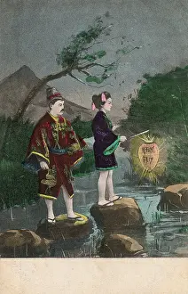 Nightime: Chinese couple on a romantic midnight stroll