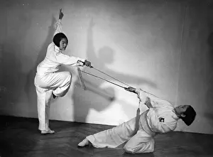 Diagonal: Chinese fencers, 1937